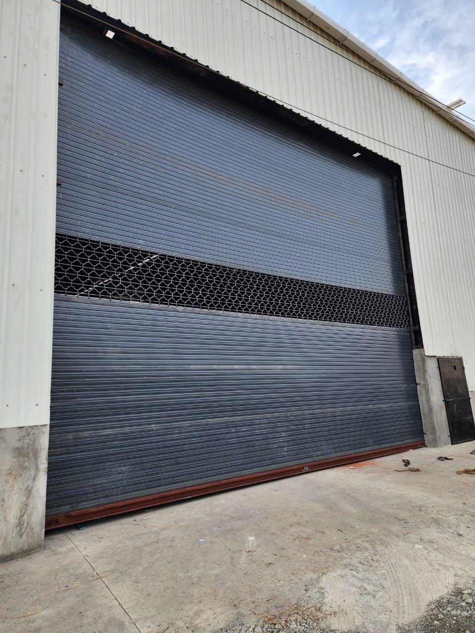 grill with powder coated motorised rolling shutter